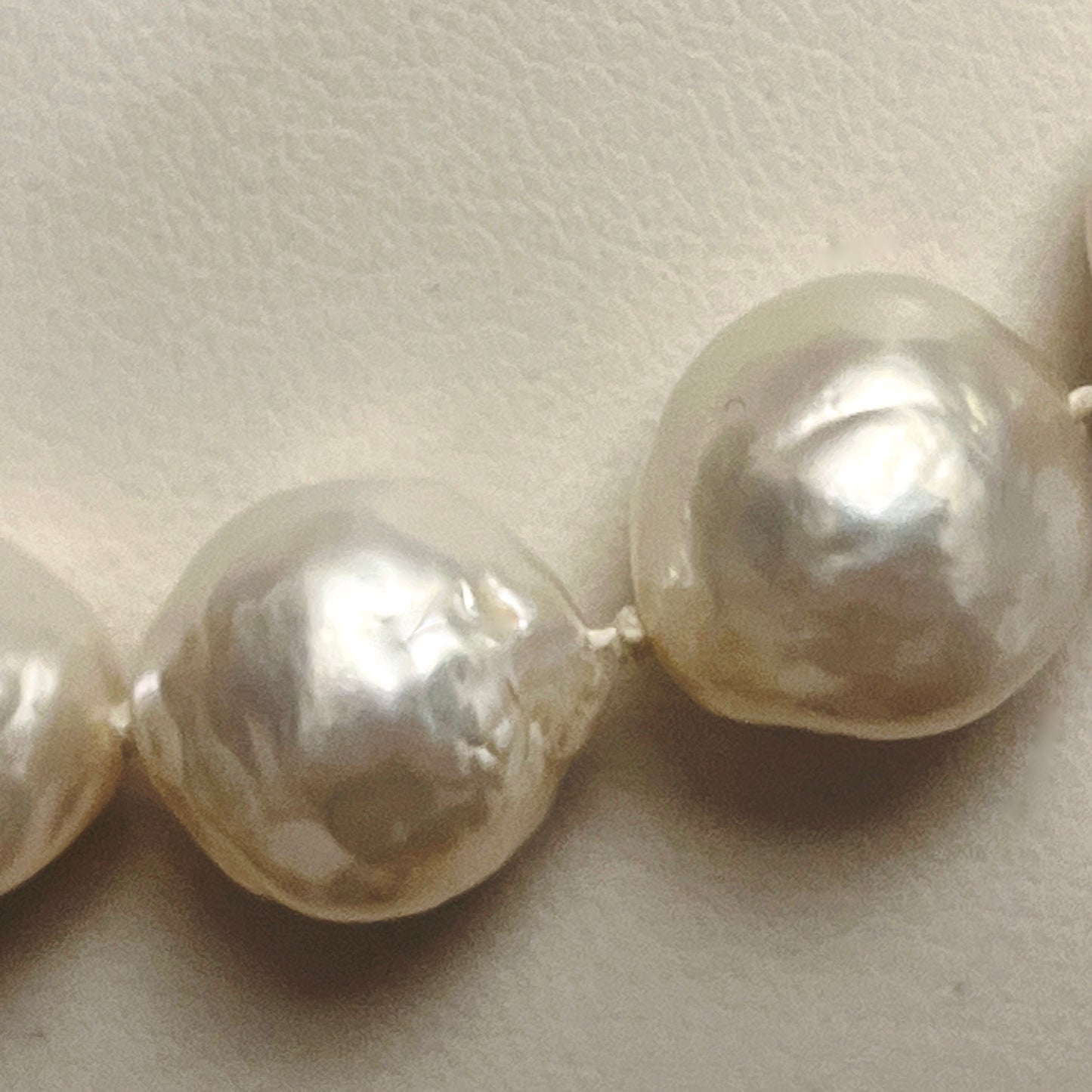 Large white nucleated pearls with sterling silver box clasp